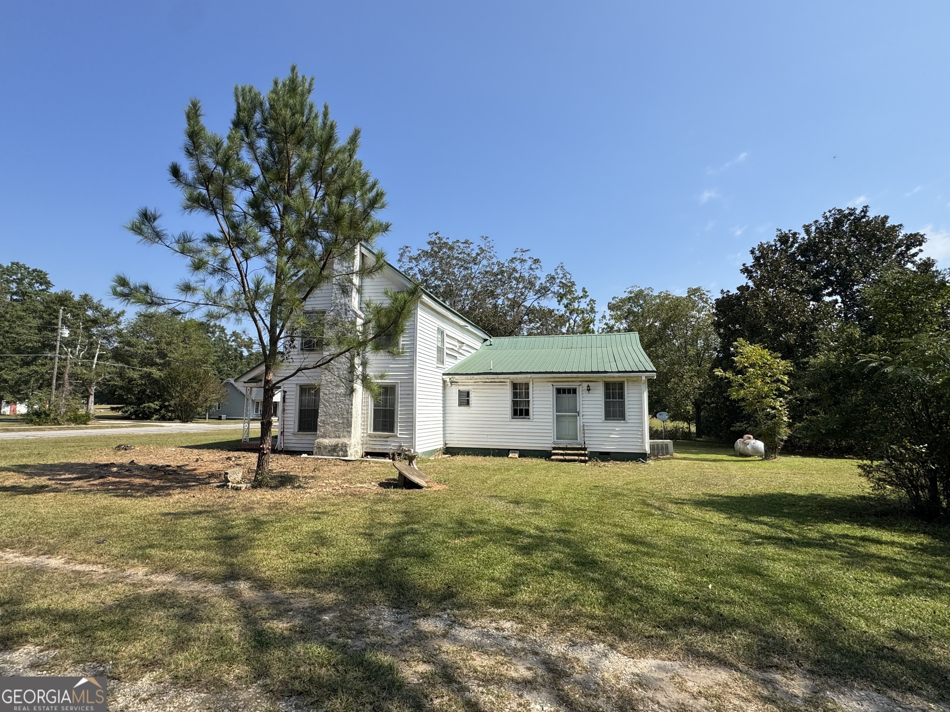 205 Highway 186, Unit TRACT 1 Good Hope, GA 30641 - Photo 4 of 28 a view of a house with a yard