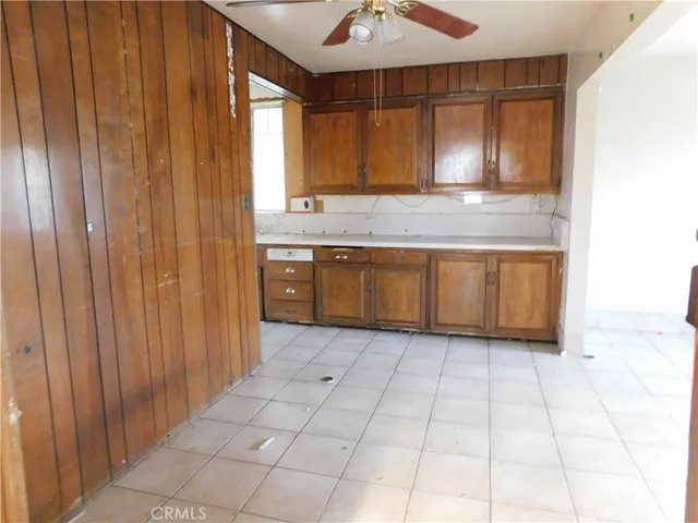 a kitchen with a sink and a window