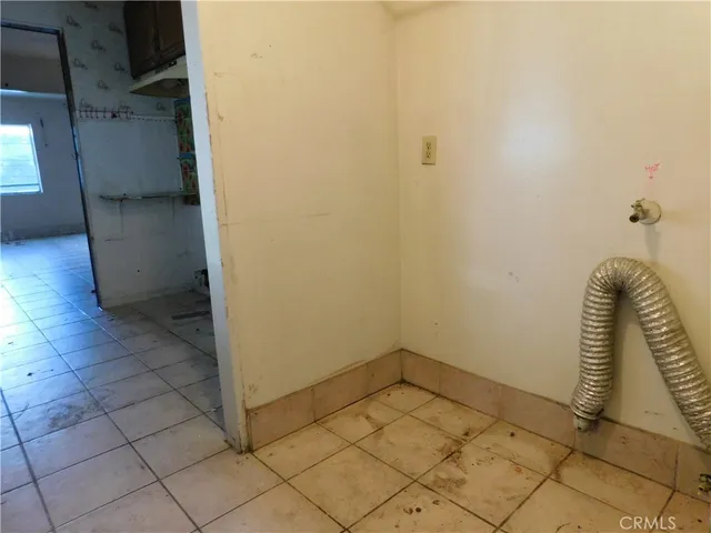 a view of a room with rack on the wall