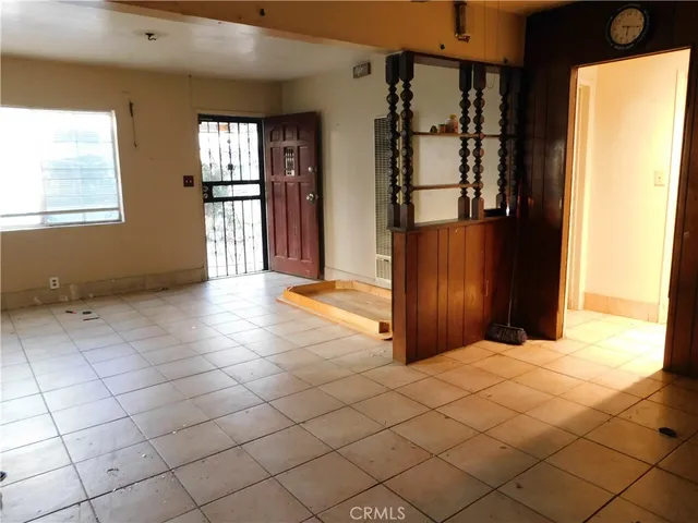 a view of kitchen with granite countertop cabinets sink and a granite counter top