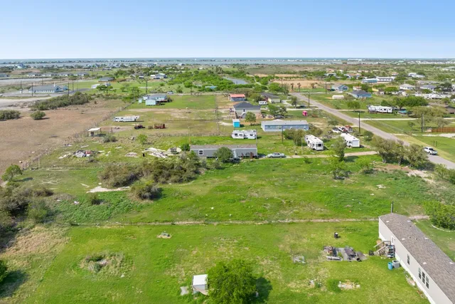 a bathroom with a small yard and green space