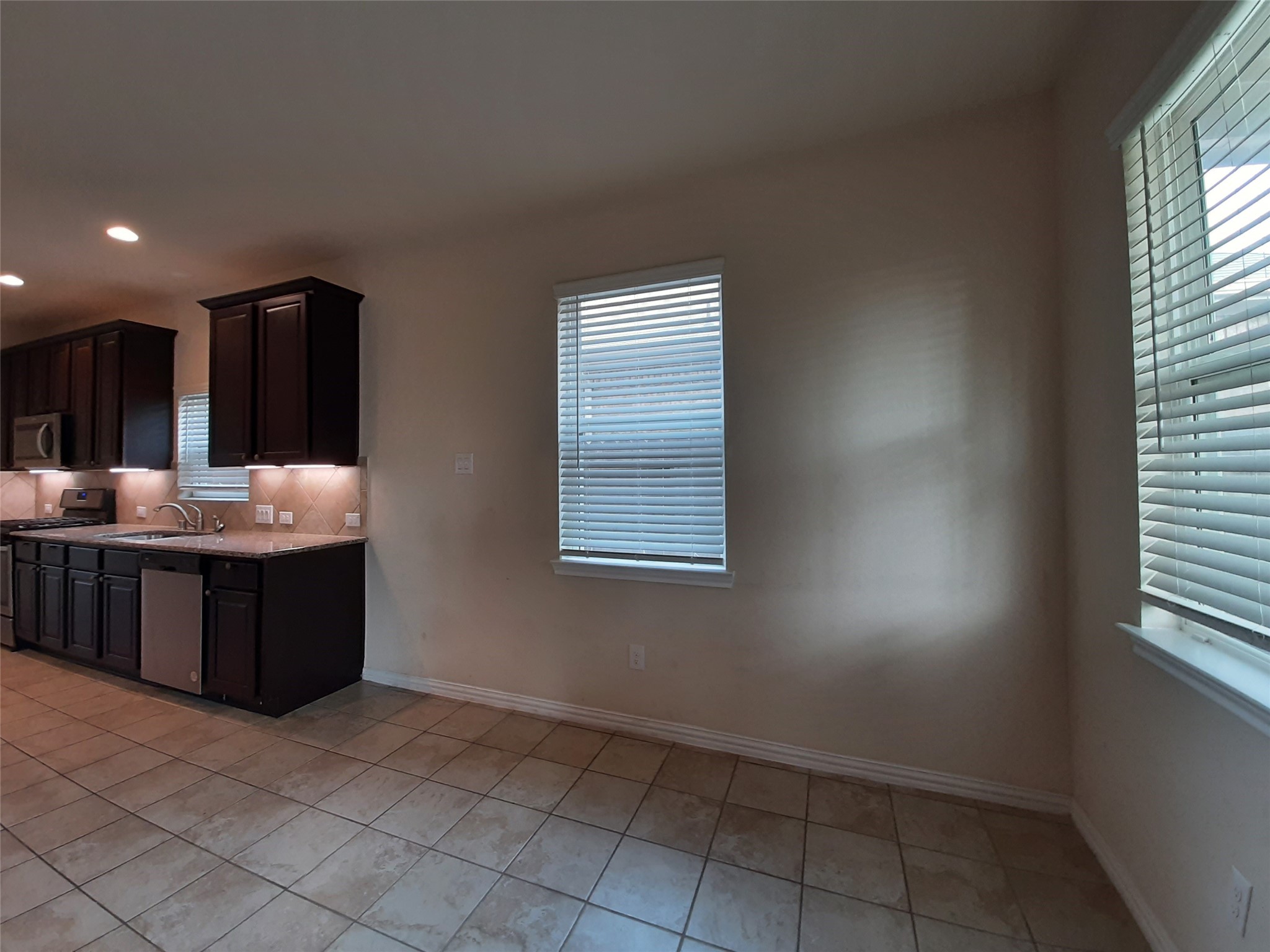 22830 Highland Bluff Lane Spring, TX 77373 - Photo 13 of 39 a bathroom with a tub vanity and window