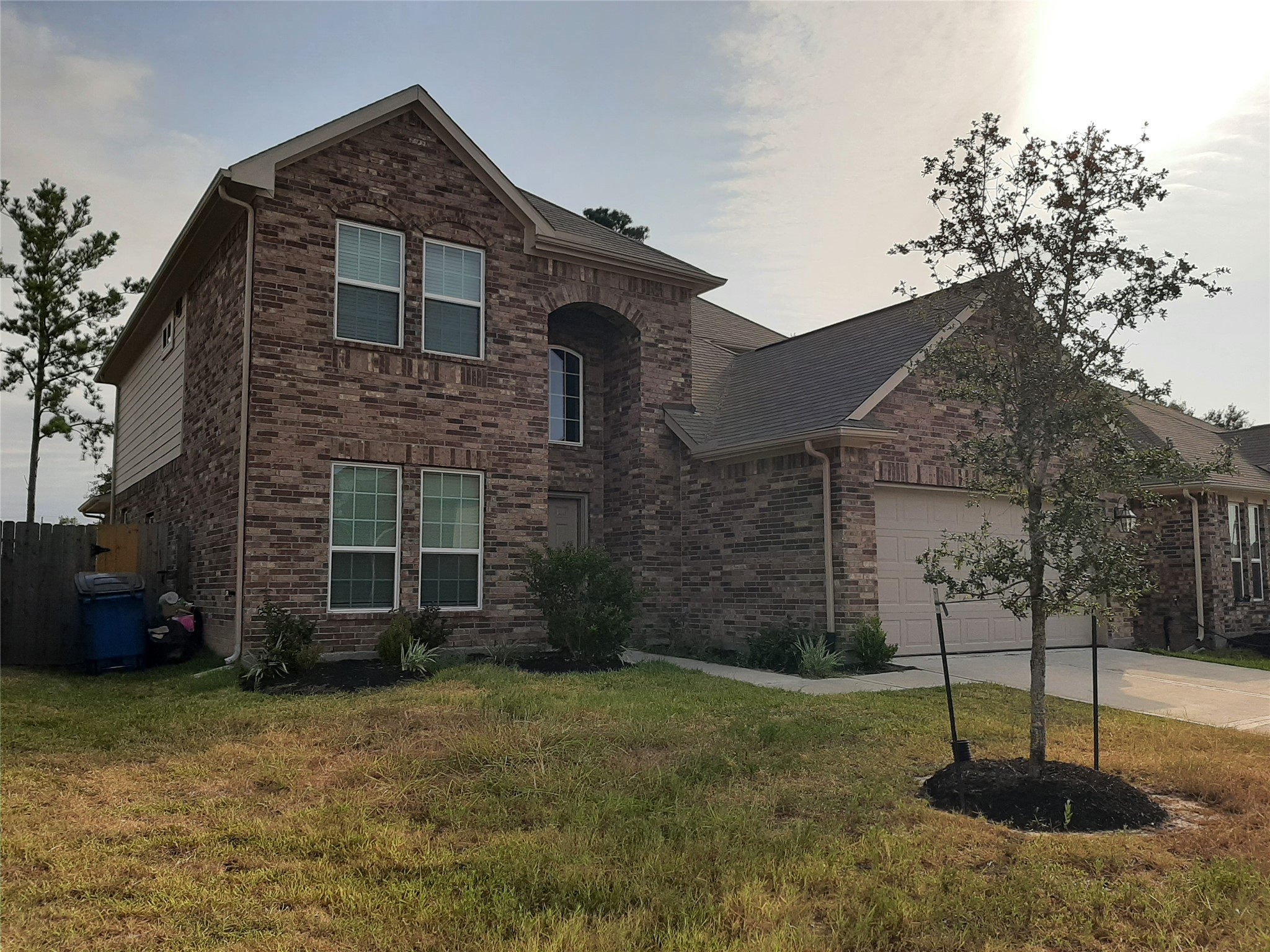 22830 Highland Bluff Lane Spring, TX 77373 - Photo 2 of 39 a front view of a house with a garden