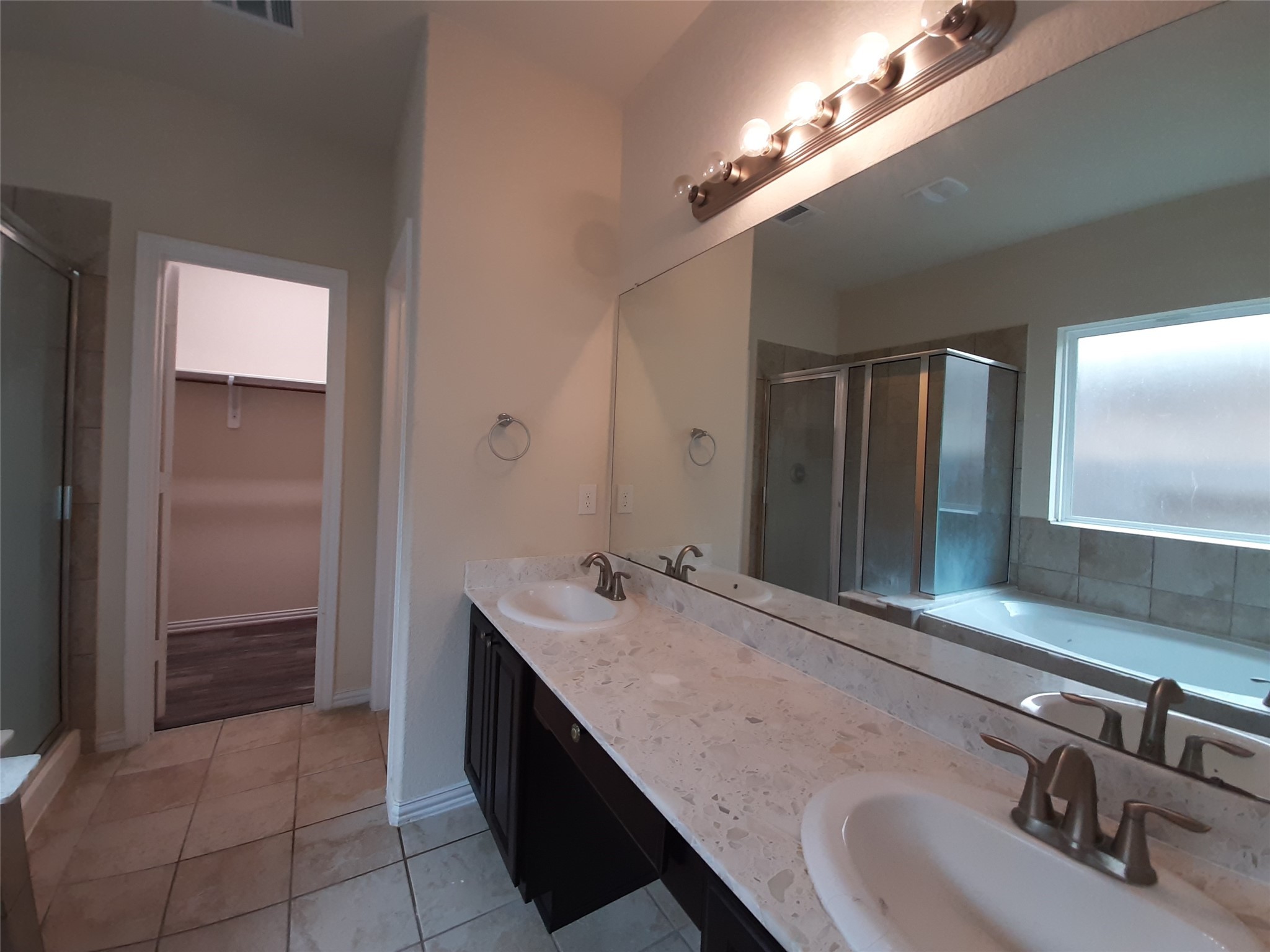 22830 Highland Bluff Lane Spring, TX 77373 - Photo 22 of 39 a bathroom with a sink and a mirror