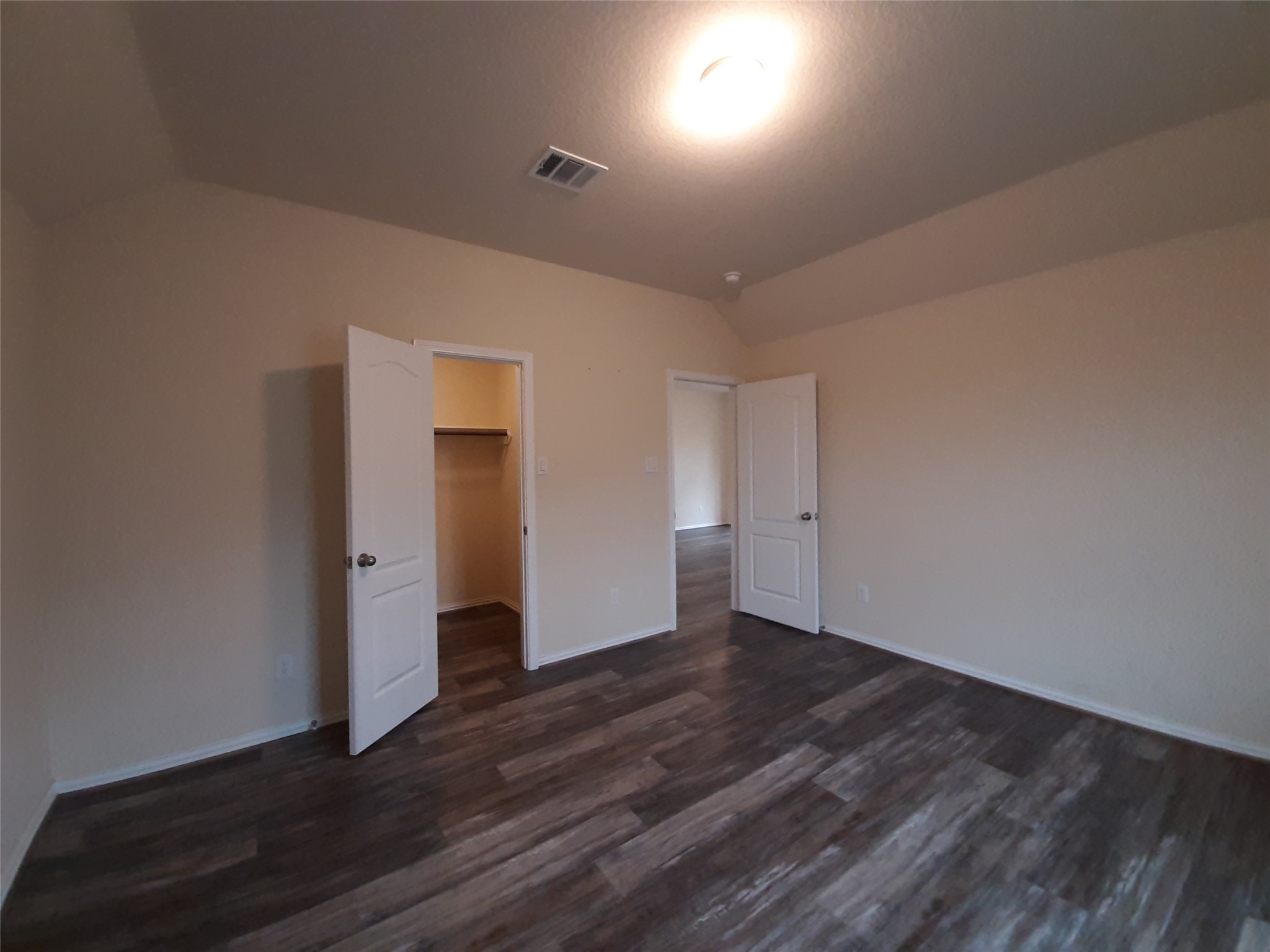 22830 Highland Bluff Lane Spring, TX 77373 - Photo 27 of 39 a view of an empty room with wooden floor and closet
