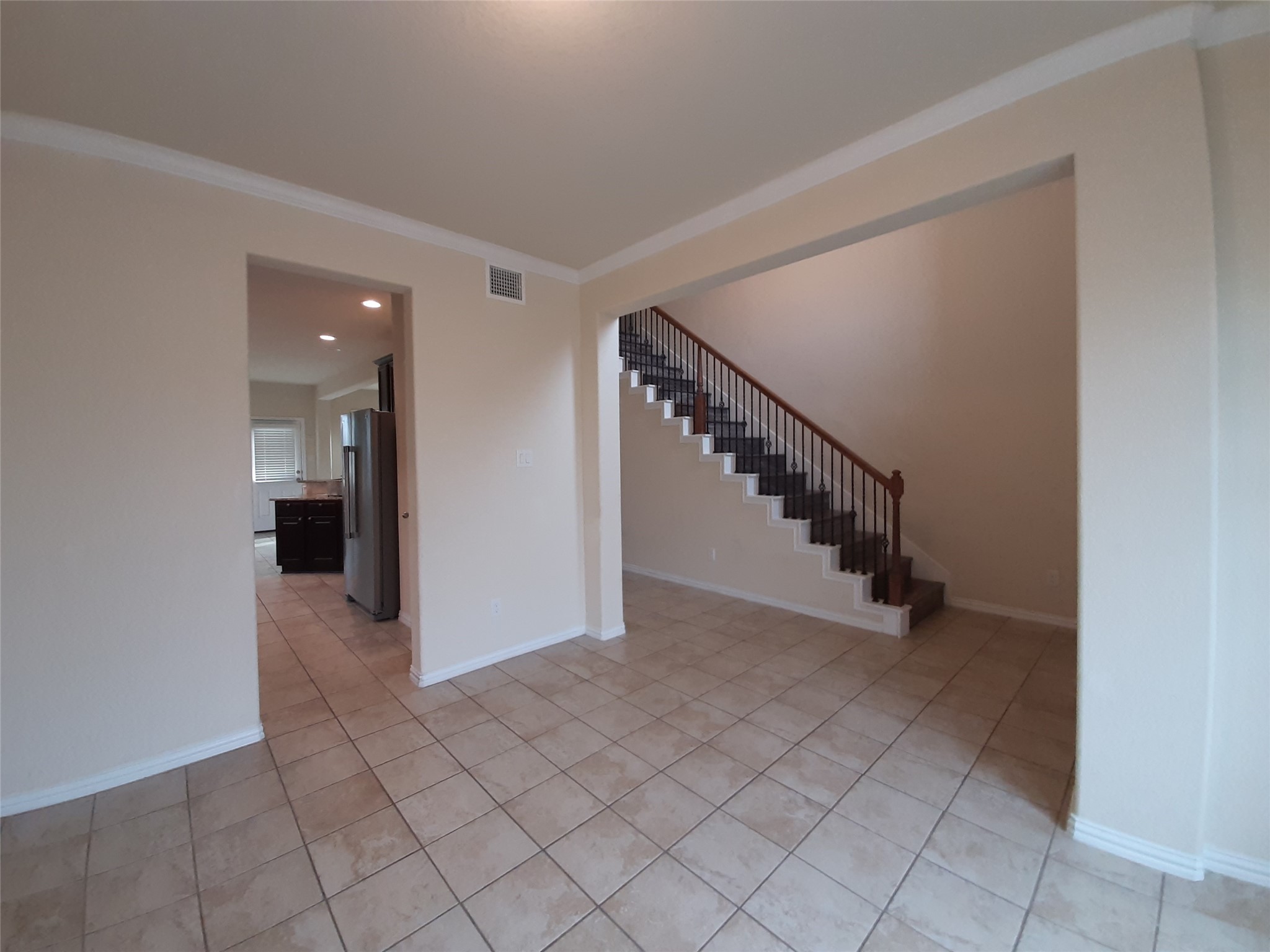 22830 Highland Bluff Lane Spring, TX 77373 - Photo 4 of 39 a view of an entryway with stairs