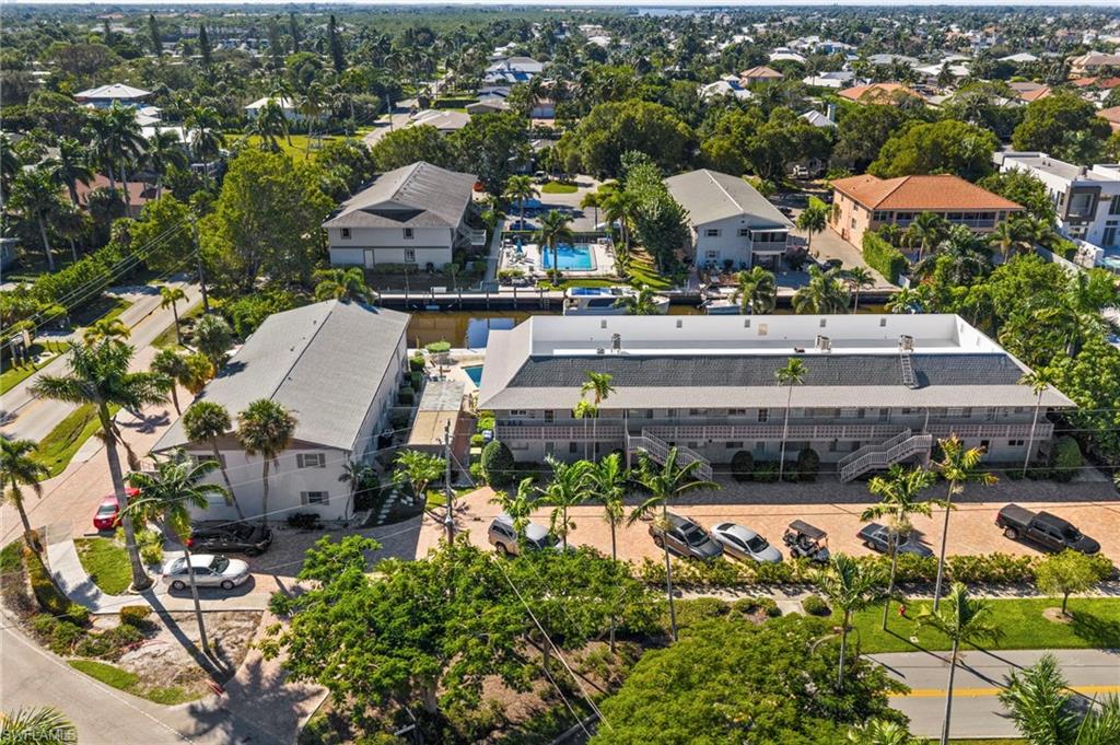 1686 Blue Point Avenue, Unit A1 Naples, FL 34102 - Photo 35 of 38 an aerial view of multiple house