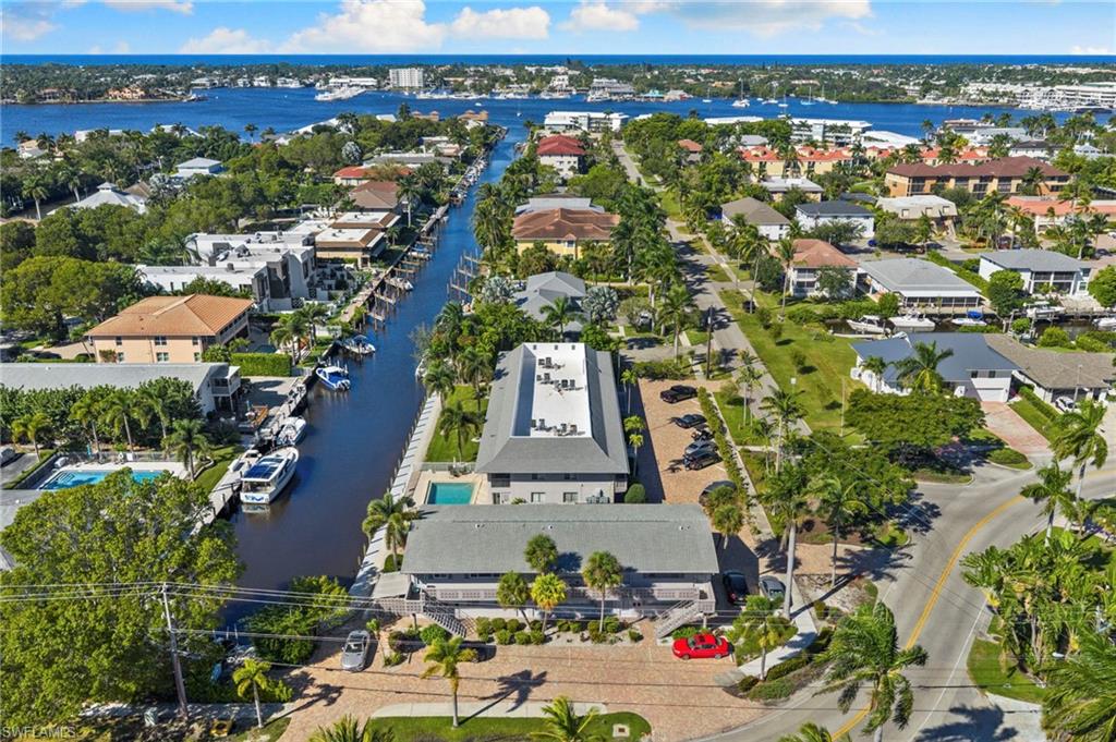 1686 Blue Point Avenue, Unit A1 Naples, FL 34102 - Photo 36 of 38 an aerial view of multiple house