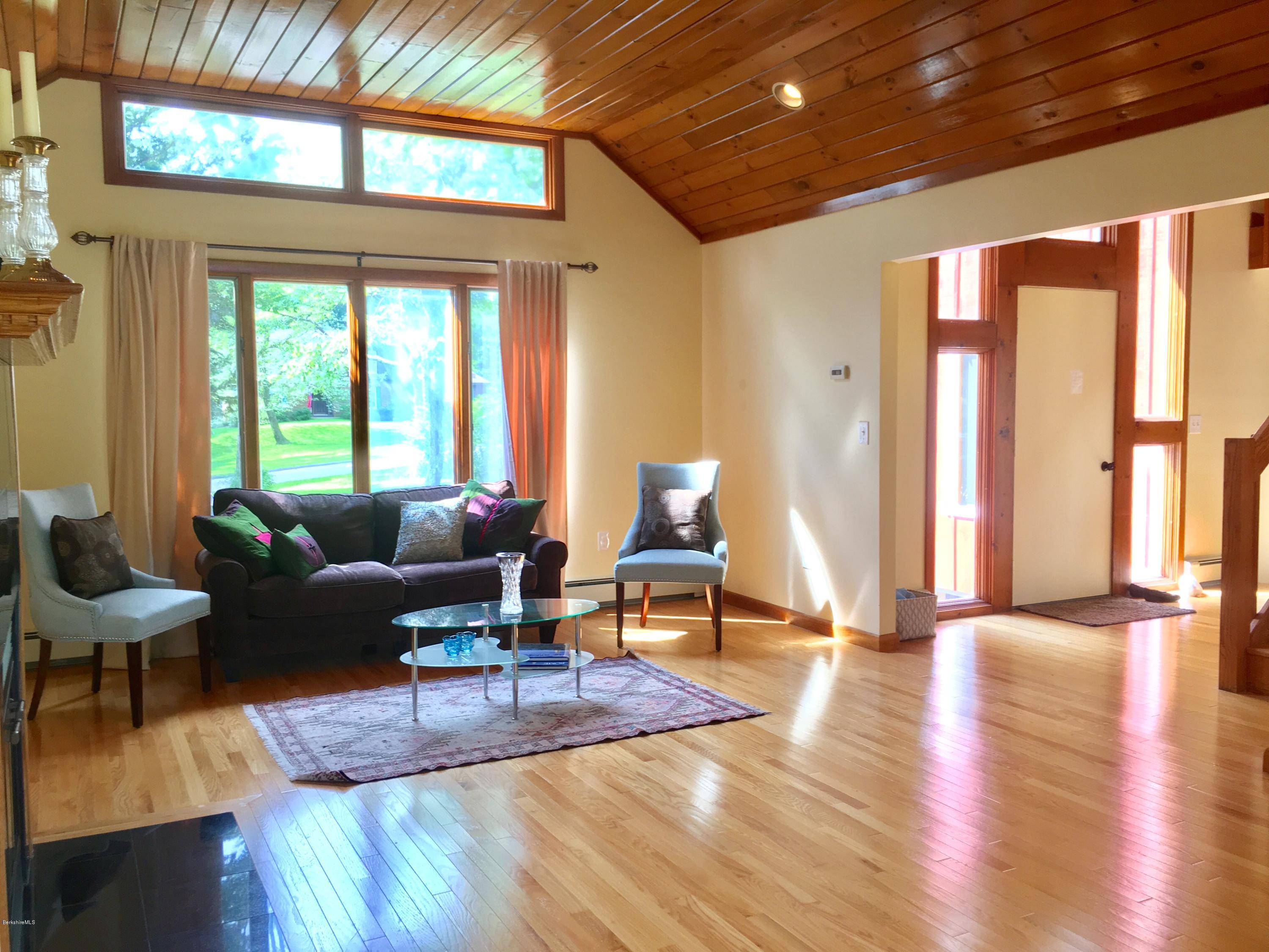 41 Pine Knoll Road Lenox, MA 01240 - Photo 2 of 37 a living room with furniture and a large window
