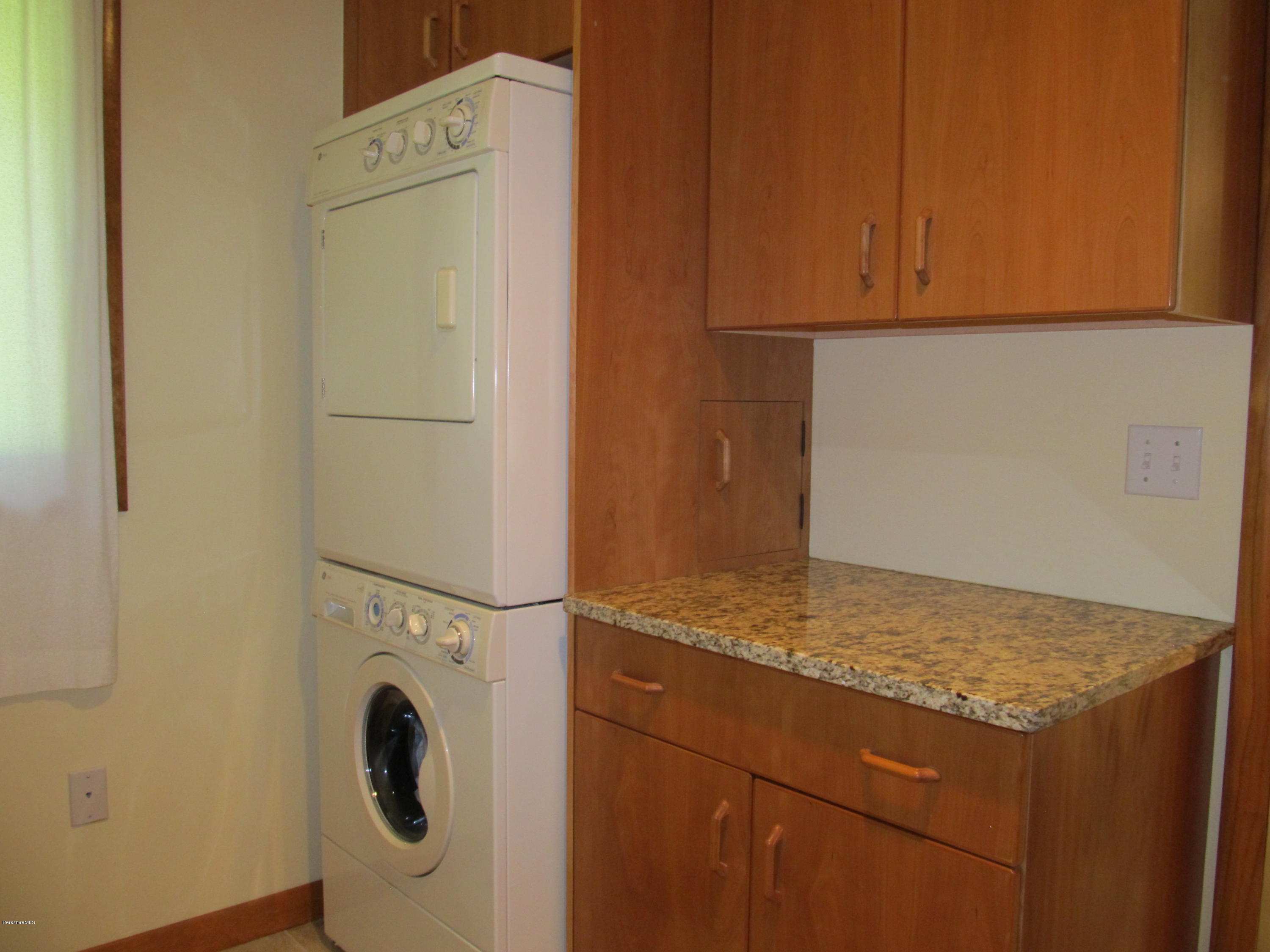 41 Pine Knoll Road Lenox, MA 01240 - Photo 16 of 37 a utility room with dryer and washer