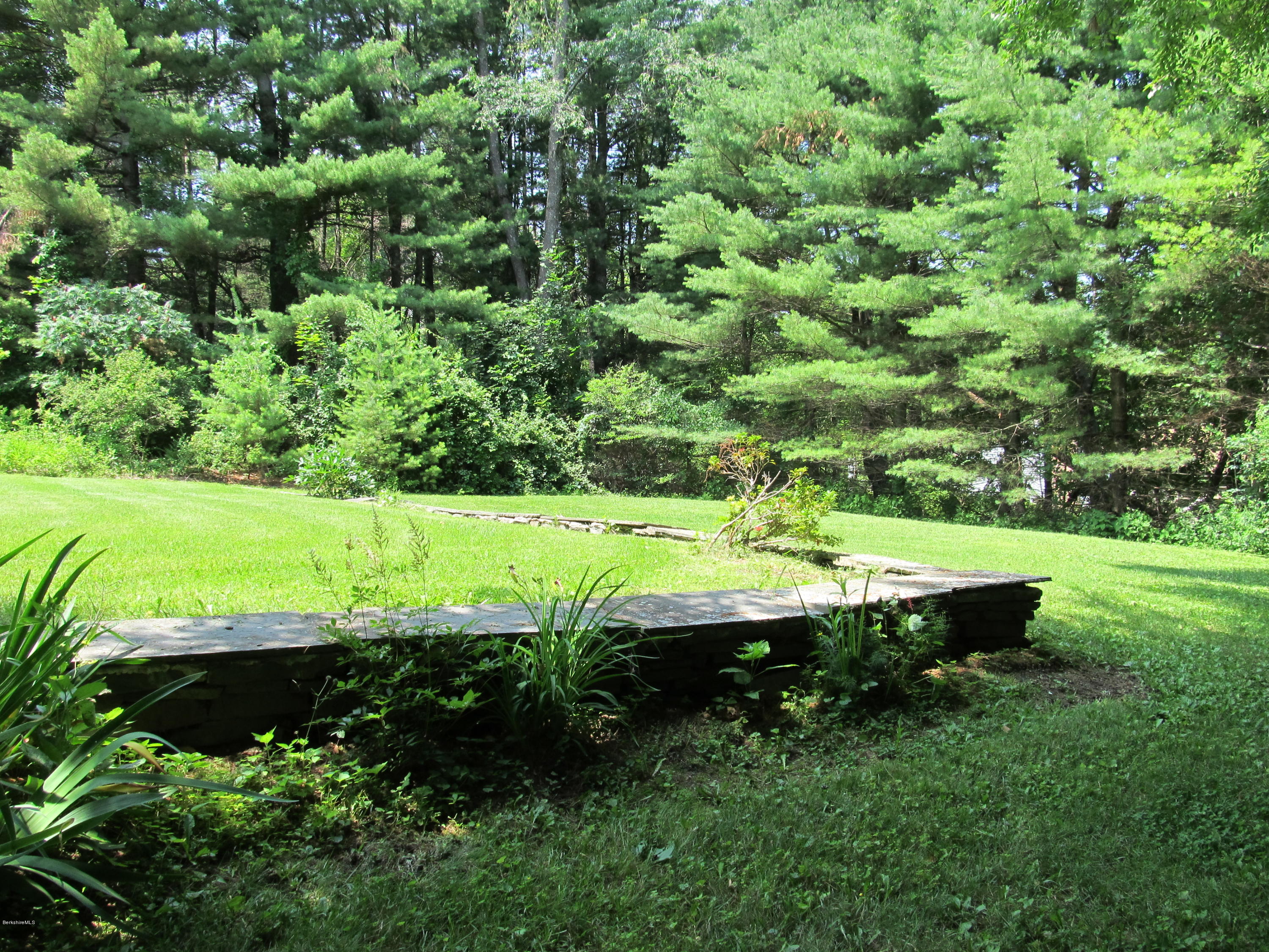 41 Pine Knoll Road Lenox, MA 01240 - Photo 25 of 37 a view of an outdoor space and a yard