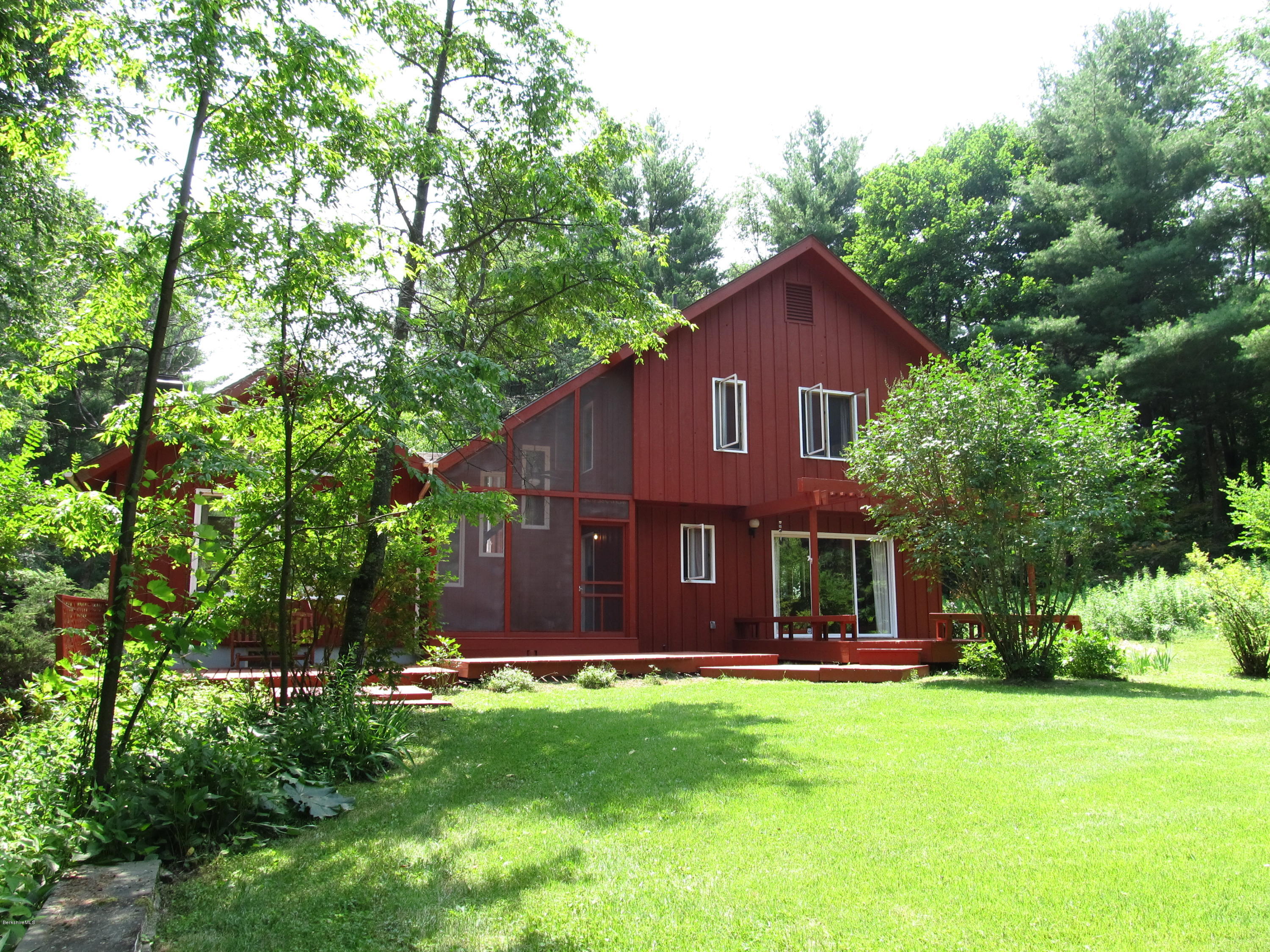 41 Pine Knoll Road Lenox, MA 01240 - Photo 26 of 37 front view of a house with a yard