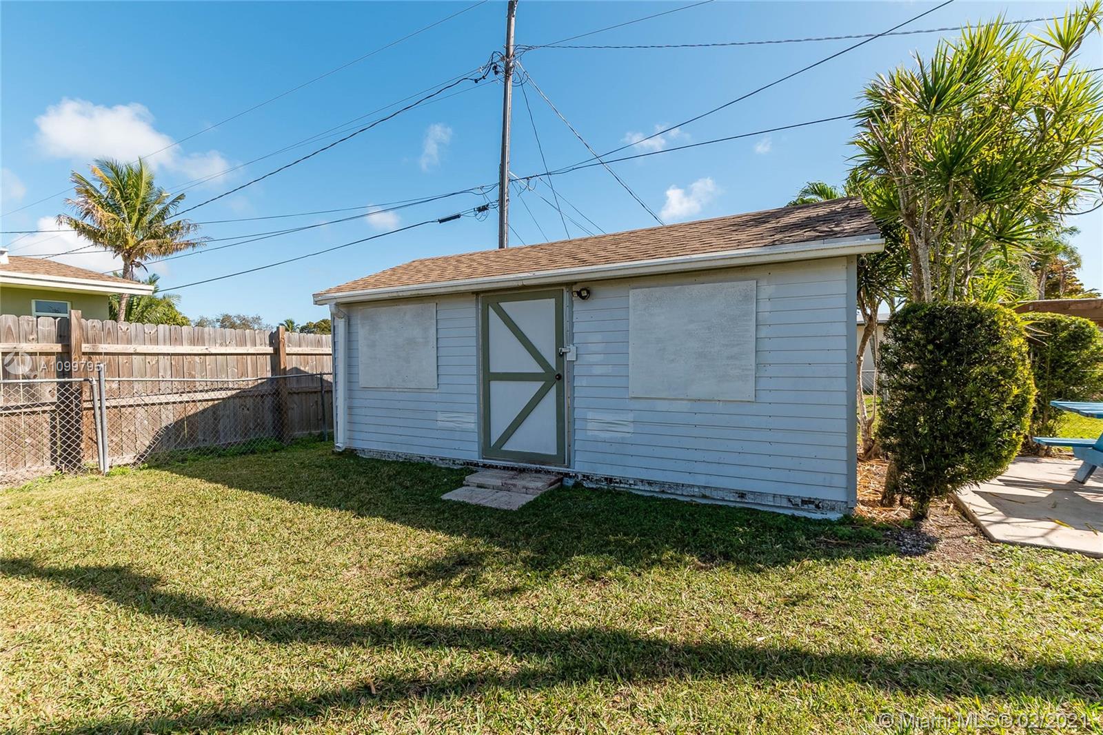 19931 Dothan Road Cutler Bay, FL 33157 - Photo 21 of 27 a backyard of a house
