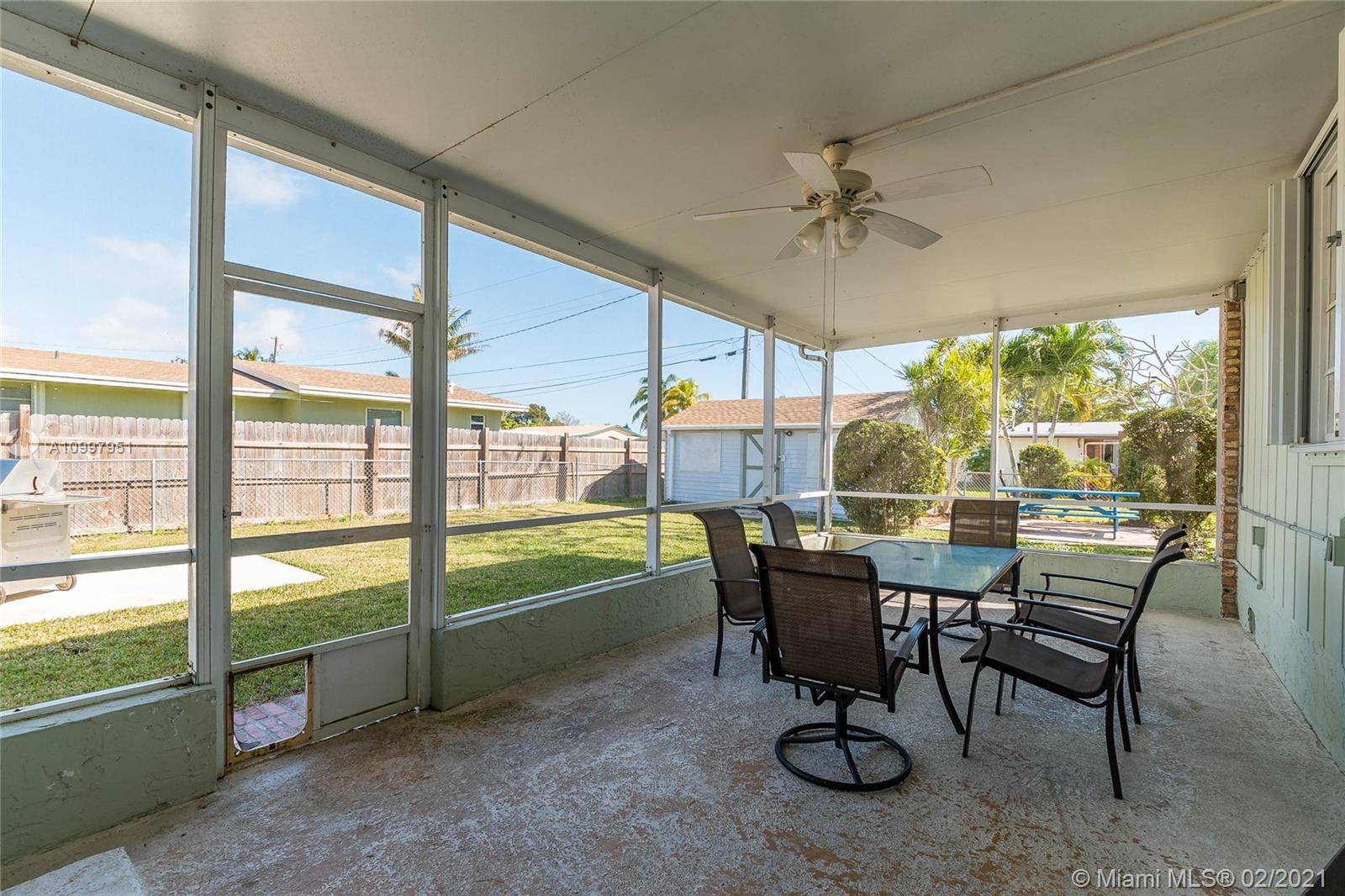 19931 Dothan Road Cutler Bay, FL 33157 - Photo 8 of 27 a view of a dining room with furniture window and outside view