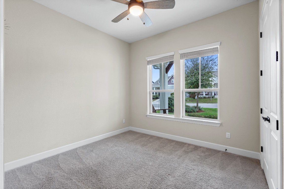 1046 Hazy Hills Loop Dripping Springs, TX 78620 - Photo 17 of 35 an empty room with a window