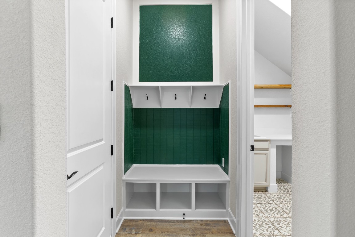 1046 Hazy Hills Loop Dripping Springs, TX 78620 - Photo 20 of 35 a view of a hallway with entryway