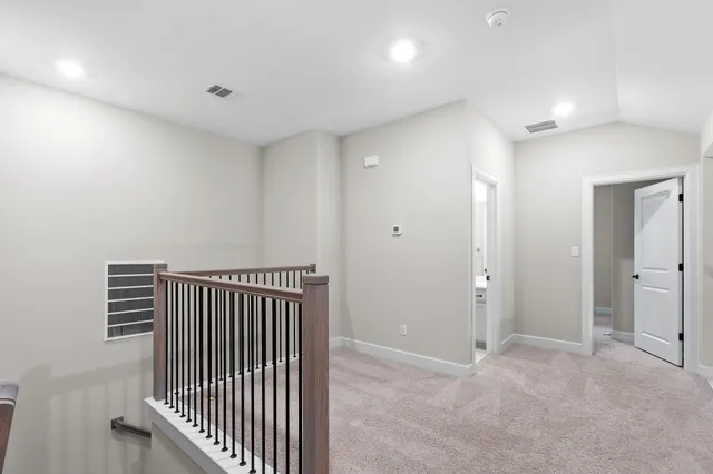 a view of a hallway with entryway