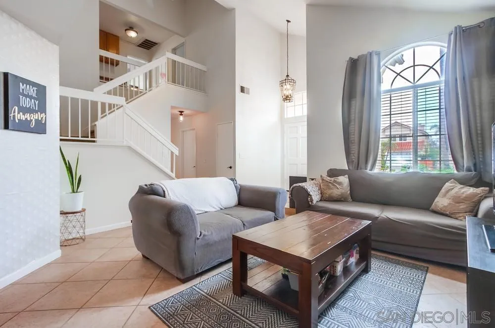 1507 Promontory Ridge Way Vista, CA 92081 - Photo 4 of 28 a living room with furniture and a large window