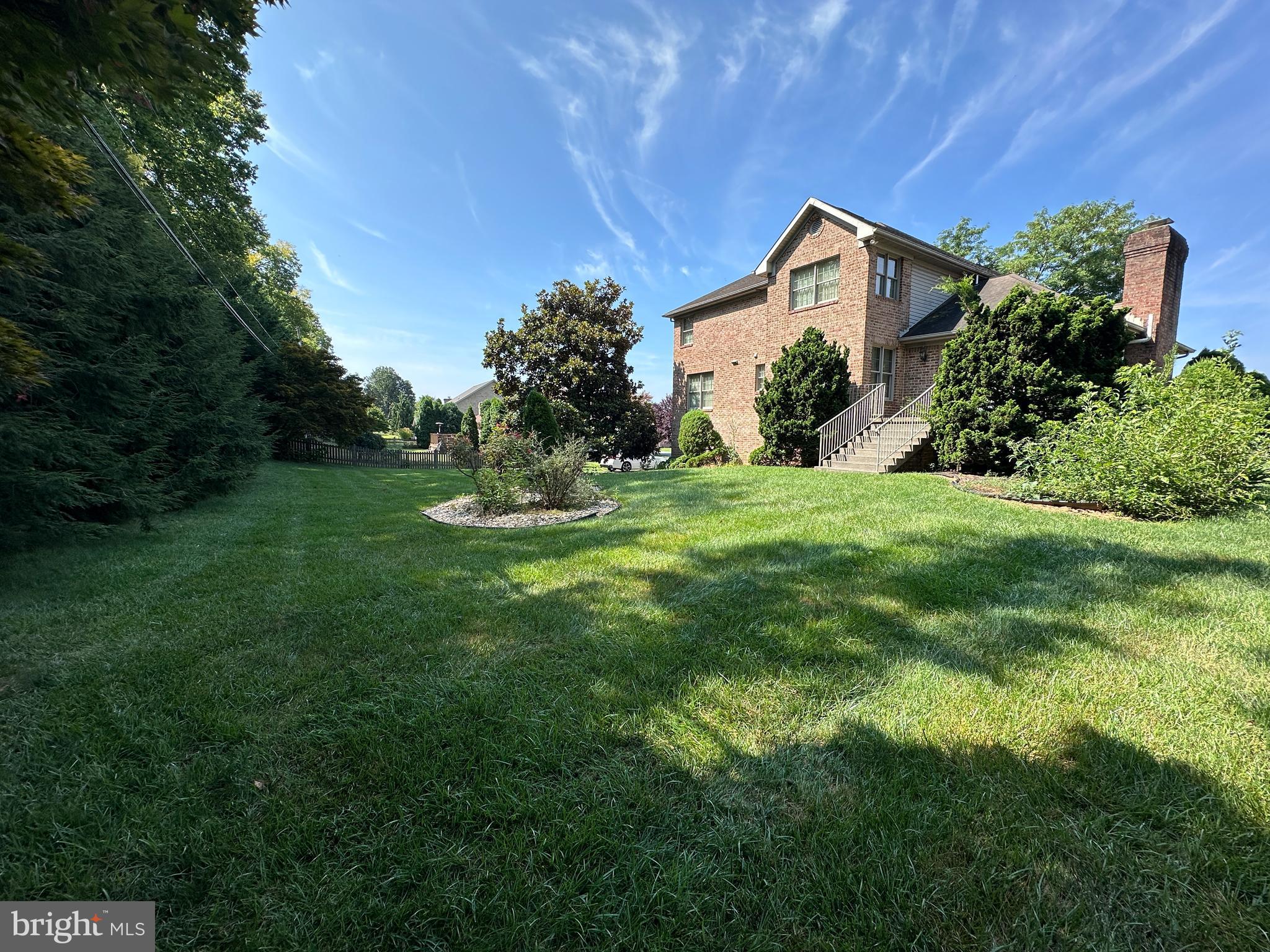 10744 Apple Tree Lane Williamsport, MD 21795 - Photo 26 of 118 a front view of a house with a yard