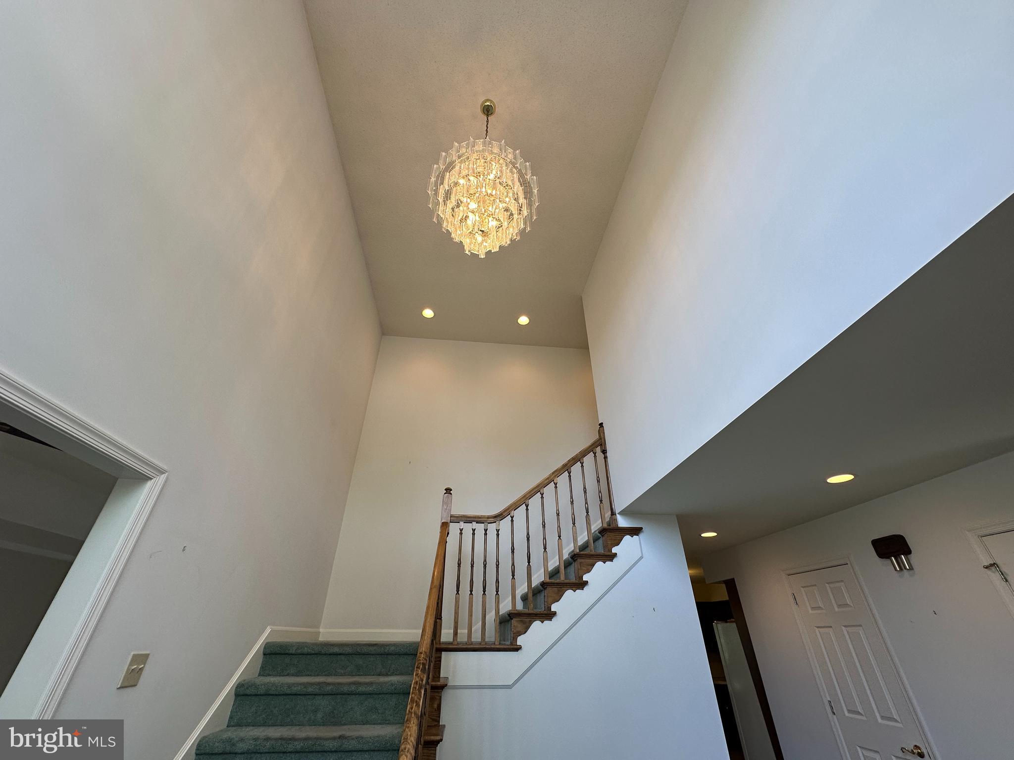 10744 Apple Tree Lane Williamsport, MD 21795 - Photo 31 of 118 a view of a hallway with wooden floor and staircase