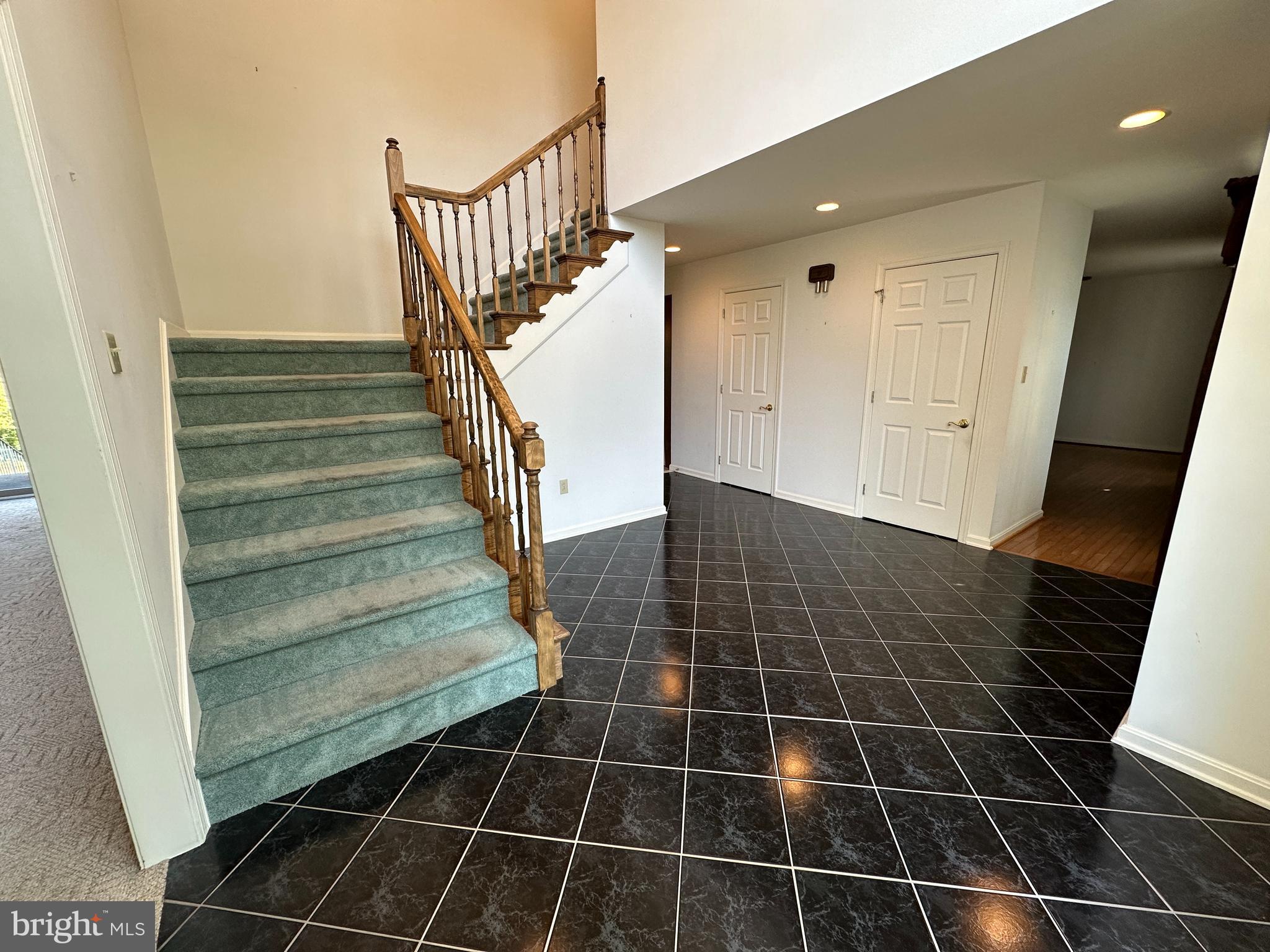 10744 Apple Tree Lane Williamsport, MD 21795 - Photo 32 of 118 a view of an empty room with wooden floor and stairs