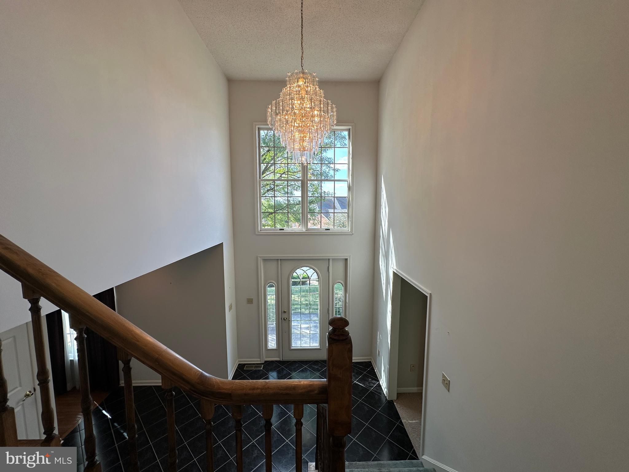 10744 Apple Tree Lane Williamsport, MD 21795 - Photo 66 of 118 a view of a hallway with windows and stairs