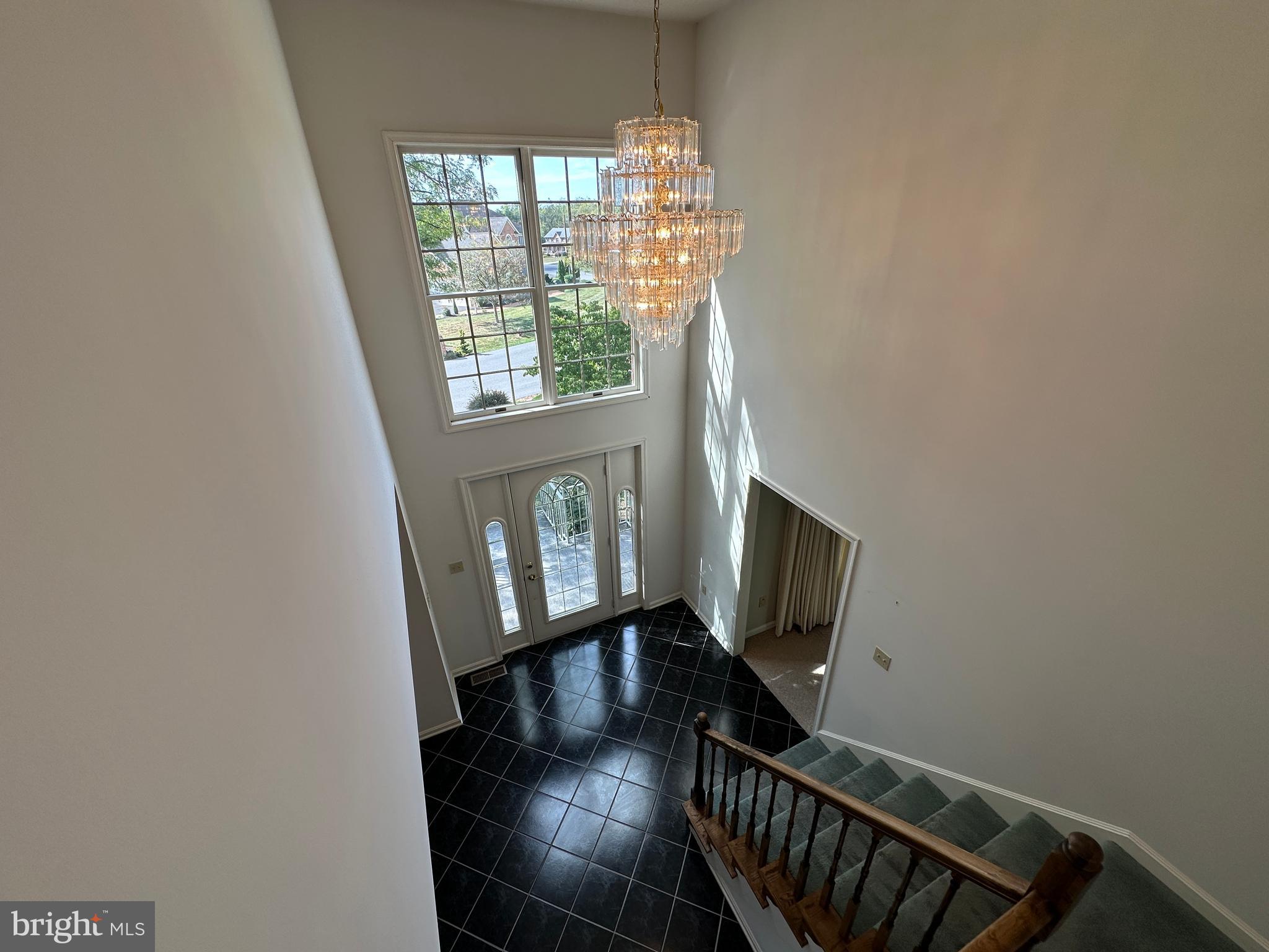 10744 Apple Tree Lane Williamsport, MD 21795 - Photo 68 of 118 a view of an empty room with wooden floor and a window