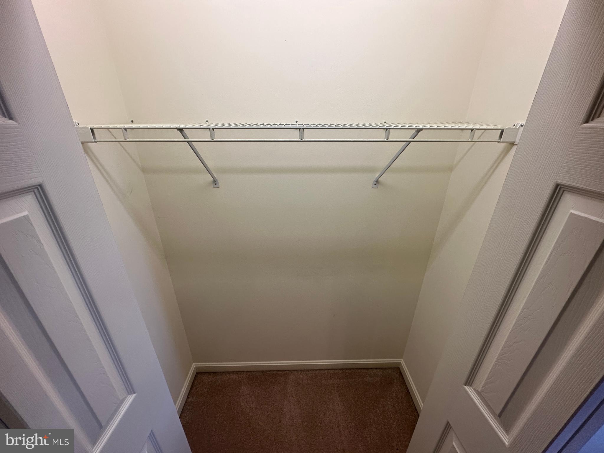 10744 Apple Tree Lane Williamsport, MD 21795 - Photo 80 of 118 a view of small space with empty racks on the wall