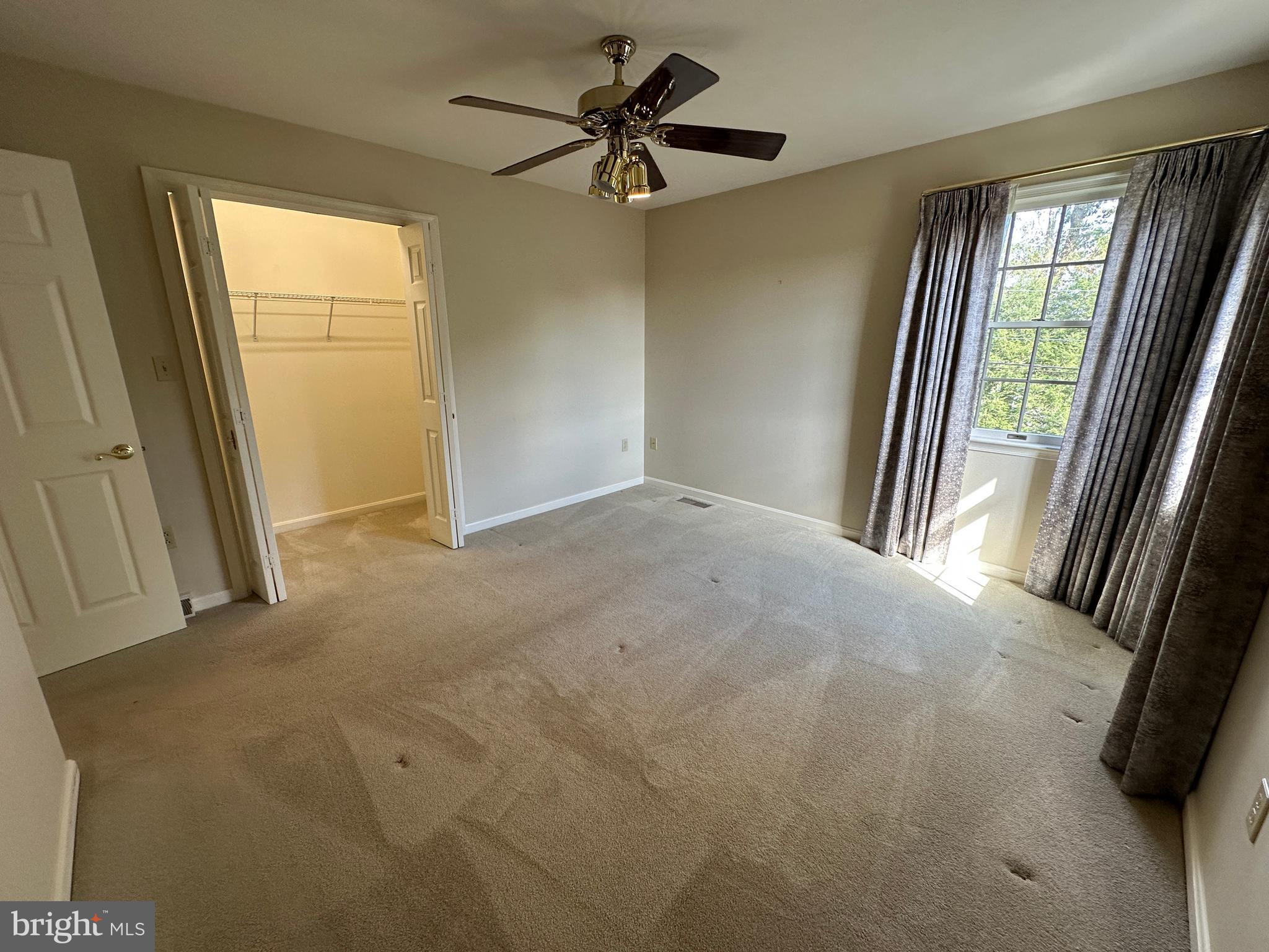 10744 Apple Tree Lane Williamsport, MD 21795 - Photo 91 of 118 a view of a room with a ceiling fan and window
