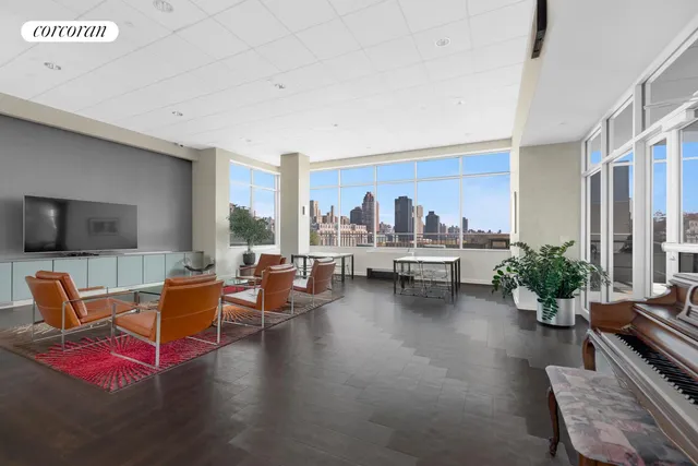 a view of a lake with sitting area