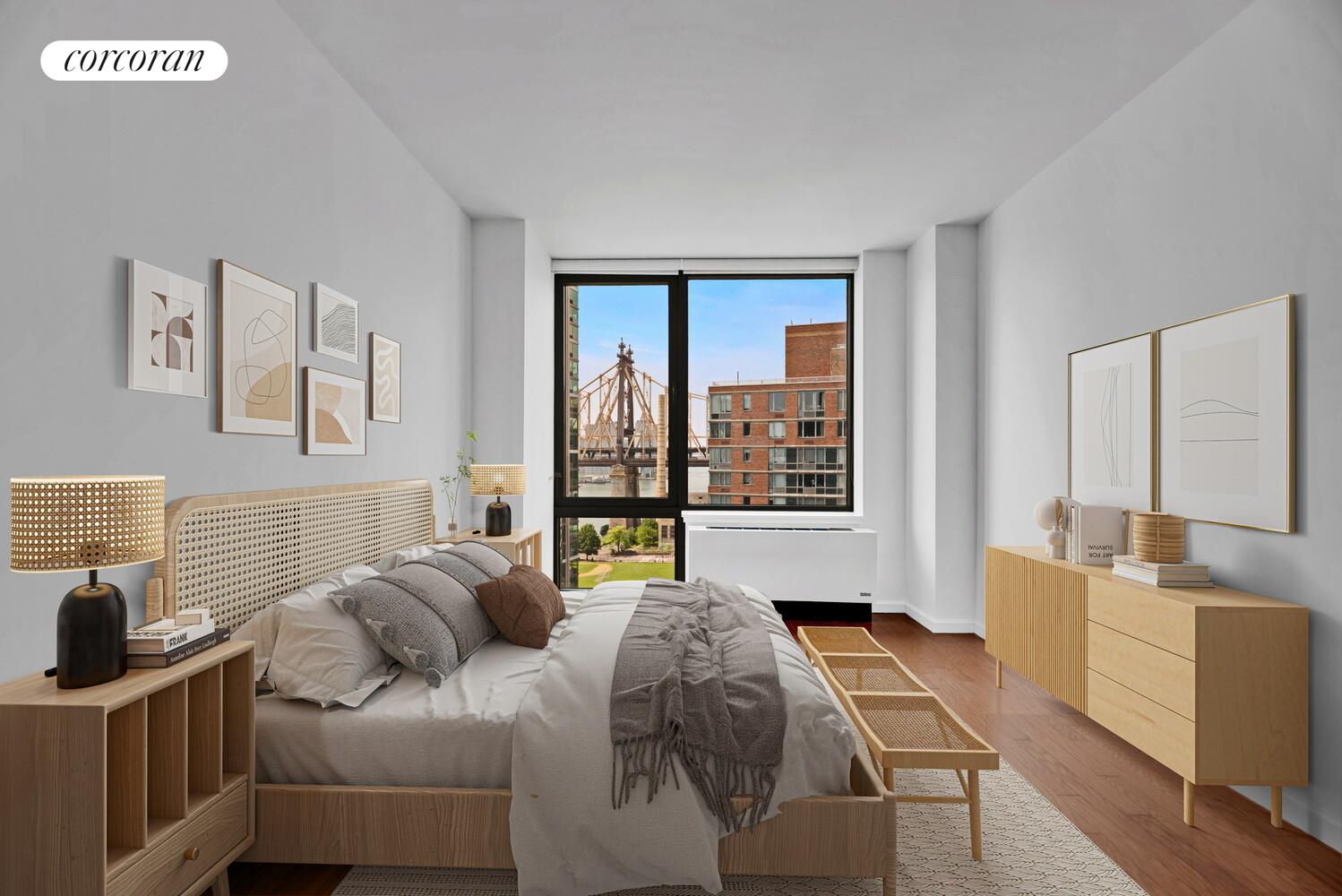 455 Main Street, Unit 16A Manhattan, NY 10044 - Photo 2 of 18 a bedroom with a bed and wooden floor