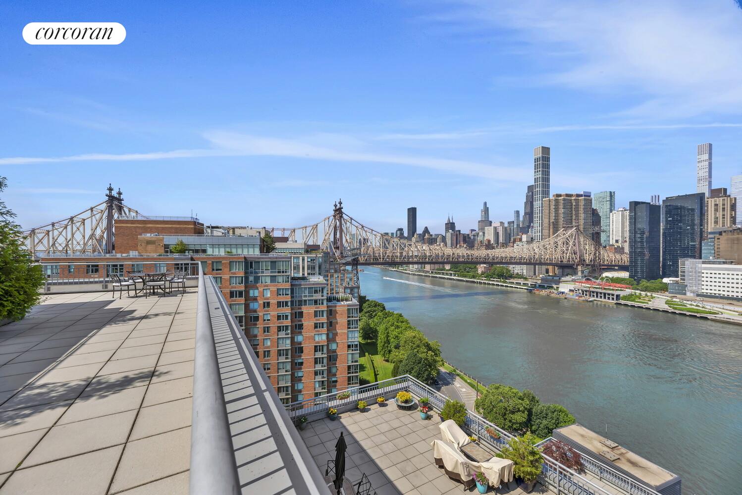 455 Main Street, Unit 16A Manhattan, NY 10044 - Photo 3 of 18 a view of city from a terrace