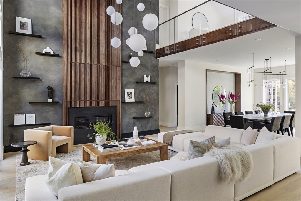 56 Bigelow Road Newton, MA 02465 - Photo 5 of 32 a living room with furniture and a fireplace