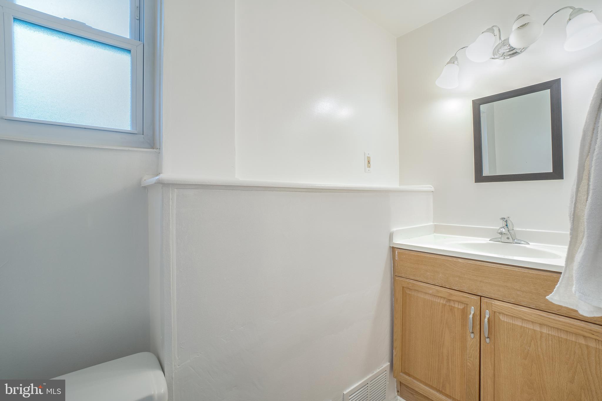4001 Hollins Ferry Road Halethorpe, MD 21227 - Photo 8 of 26 half bath on first floor