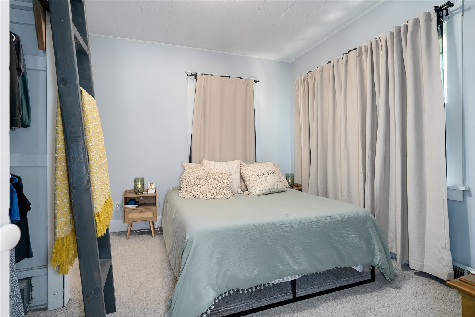 504 Normal Avenue Normal, IL 61761 - Photo 11 of 24 a bedroom with a bed and a window