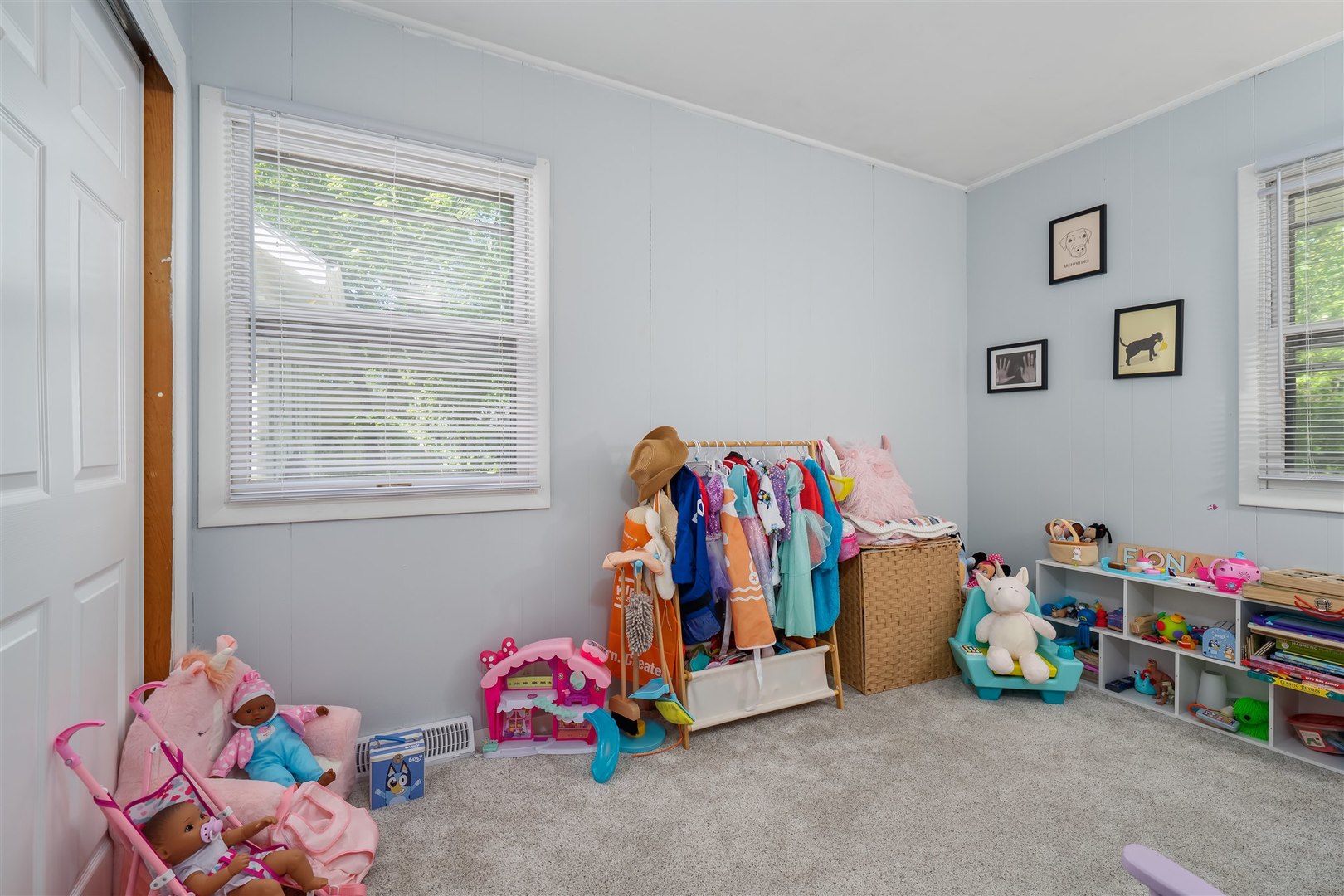 504 Normal Avenue Normal, IL 61761 - Photo 17 of 24 a children room with toys and a couch
