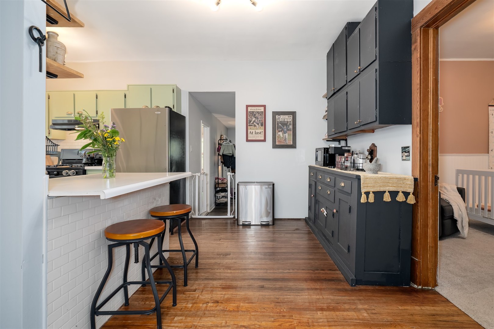 504 Normal Avenue Normal, IL 61761 - Photo 5 of 24 a view of a kitchen with furniture and a window