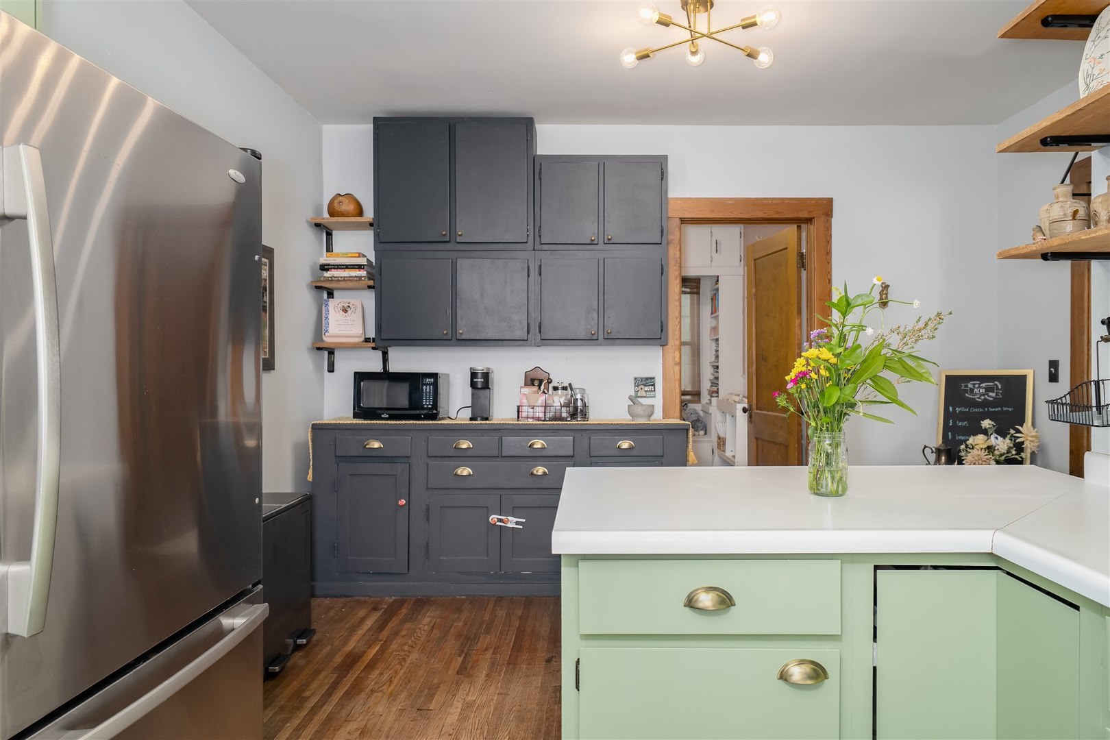 504 Normal Avenue Normal, IL 61761 - Photo 8 of 24 a kitchen with a refrigerator and a sink