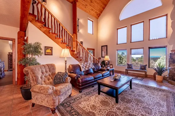 a outdoor living space with patio furniture and a potted plant