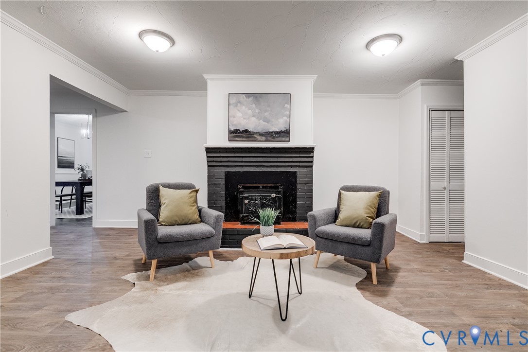 763 Oak Spring Lane Manakin-Sabot, VA 23103 - Photo 12 of 25 a living room with furniture and a fireplace
