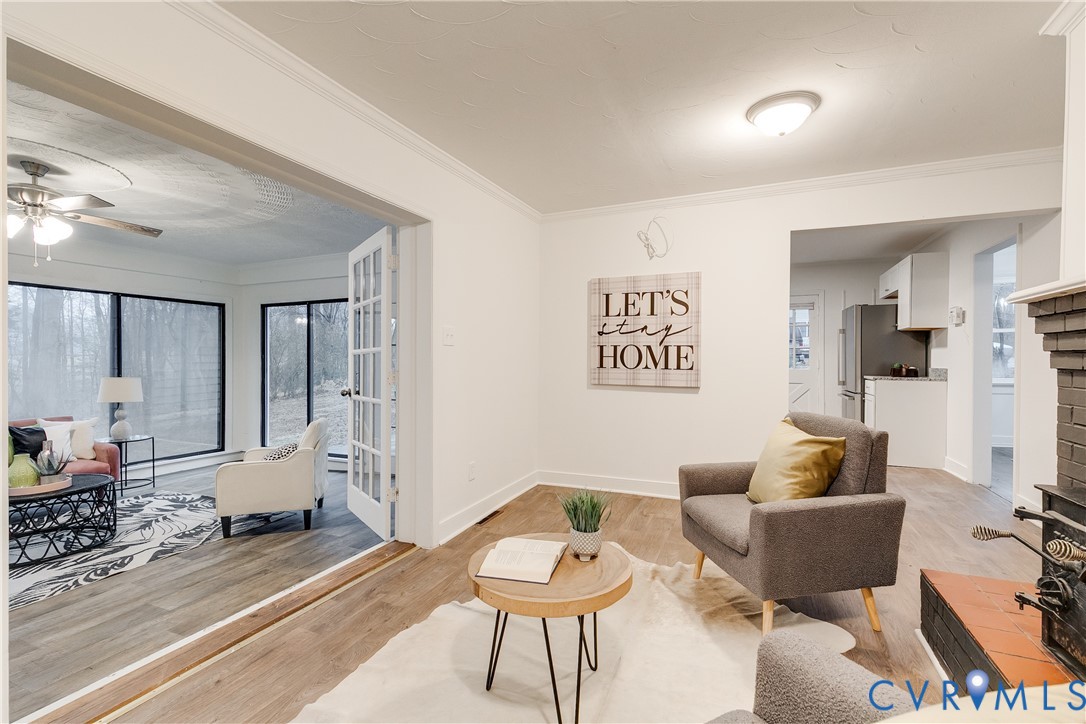 763 Oak Spring Lane Manakin-Sabot, VA 23103 - Photo 13 of 25 a living room with furniture and a wooden floor