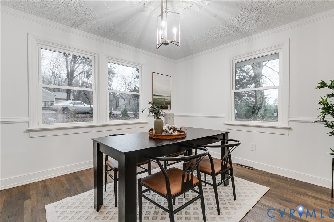 763 Oak Spring Lane Manakin-Sabot, VA 23103 - Photo 5 of 25 a view of a dining room with furniture window and wooden floor