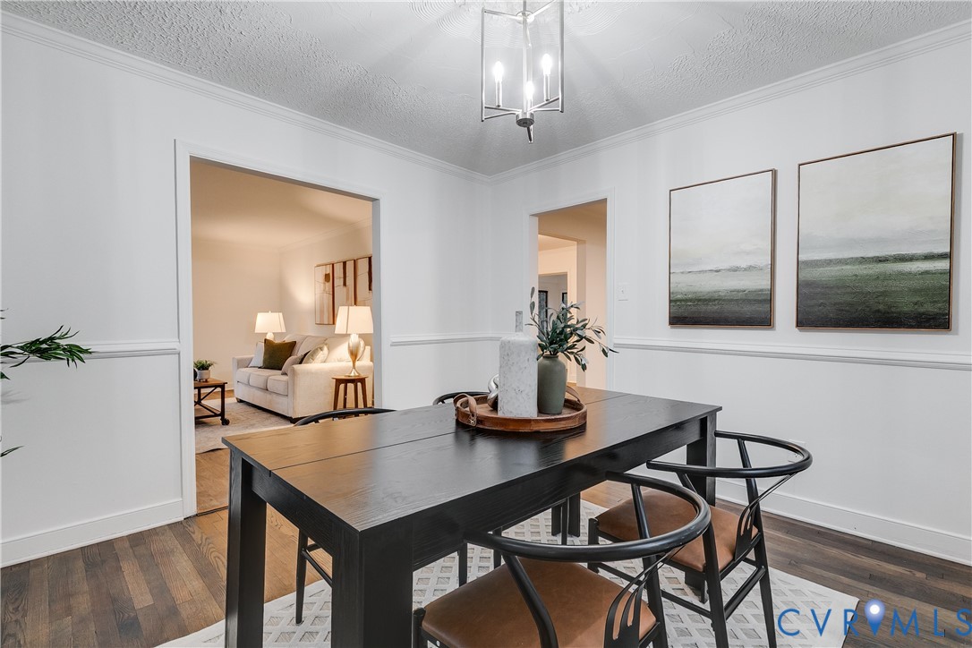 763 Oak Spring Lane Manakin-Sabot, VA 23103 - Photo 6 of 25 a view of a dining room with furniture and wooden floor