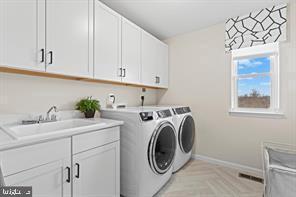 732 Round Hill Road Orange, VA 22960 - Photo 37 of 50 Upstairs laundry with sink and cabinets