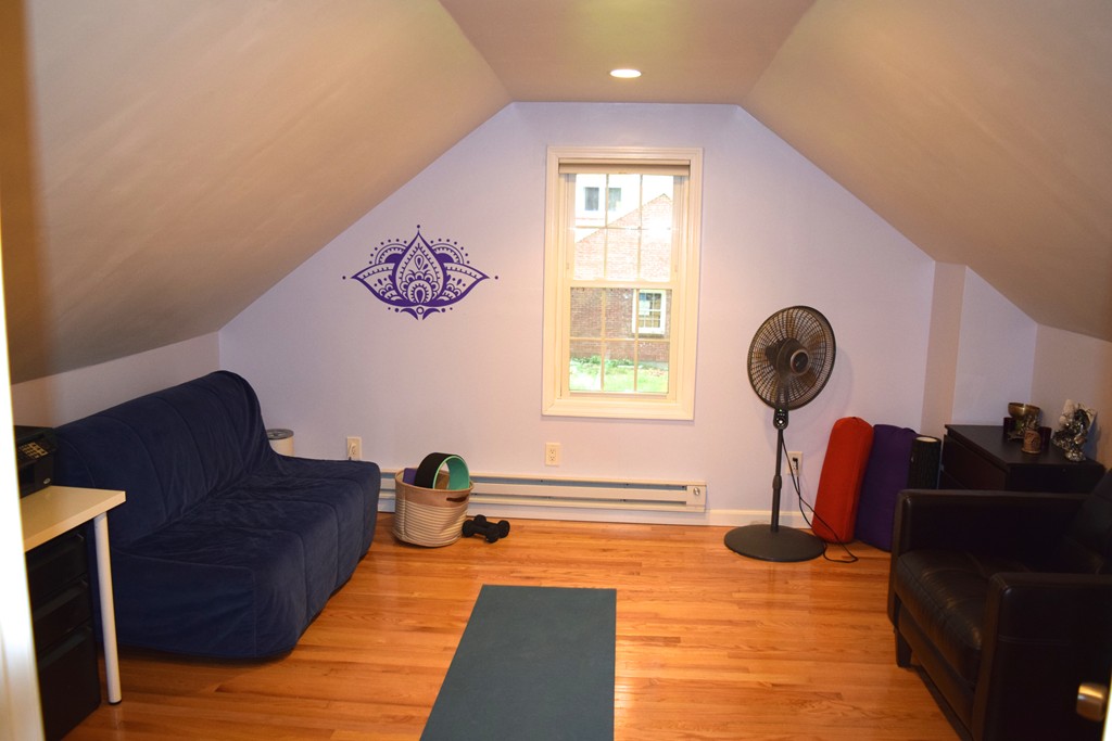 168 Boston Post Road Wayland, MA 01778 - Photo 14 of 22 a living room with furniture and a window