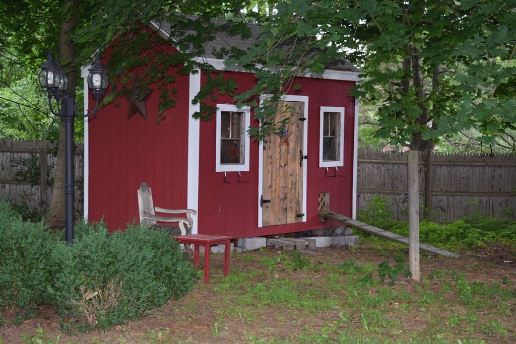 168 Boston Post Road Wayland, MA 01778 - Photo 21 of 22 front view of a house with a yard