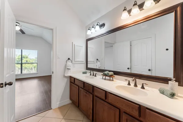 a bathroom with a bathtub and shower
