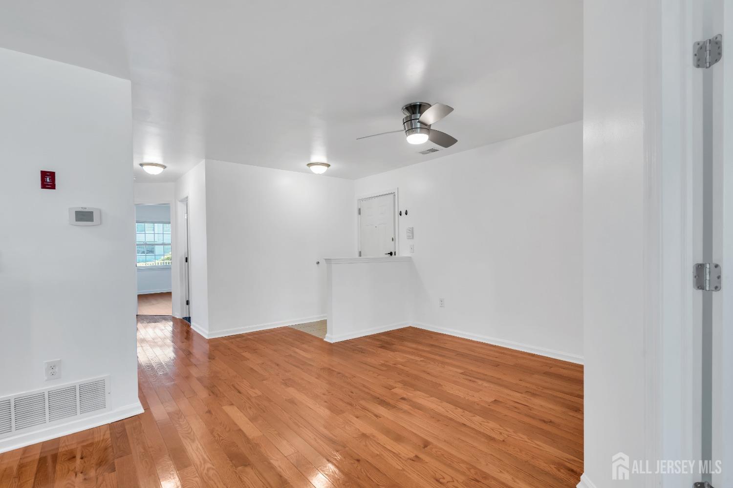 812 Edpas Road New Brunswick, NJ 08901 - Photo 8 of 31 a view of empty room with wooden floor