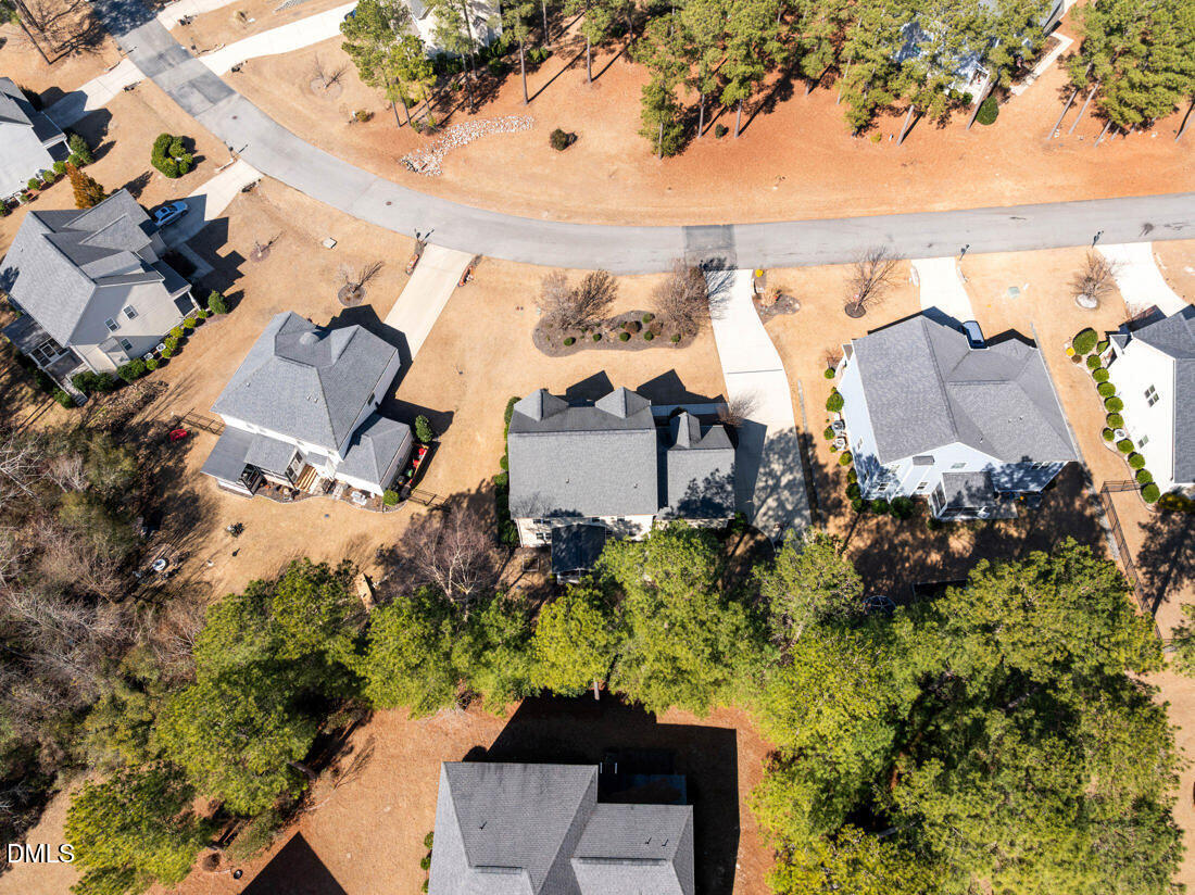 170 Valley Pines Circle Spring Lake, NC 28390 - Photo 49 of 55 an aerial view of a house with a yard and lake view