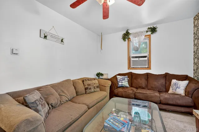 a living room with furniture and a couch